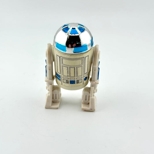 Small robot toy with a metallic head on a white background