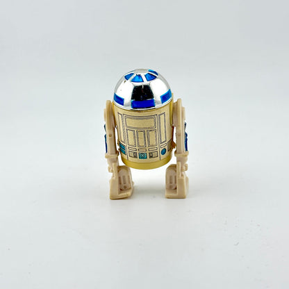 Toy robot resembling R2-D2 from Star Wars on a white background