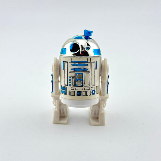 Toy robot resembling R2-D2 from Star Wars on a white background