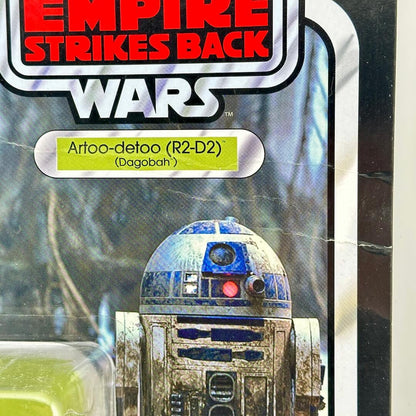 Close-up of crease to card back of Star Wars action figure packaging. 