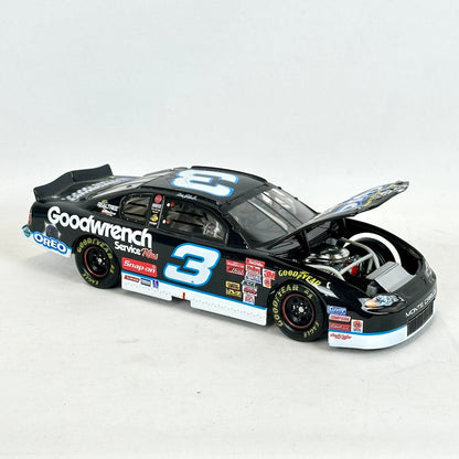 Model race car with visible branding on a white background