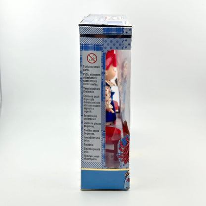 Toy packaging with safety warning label and product image on a white background