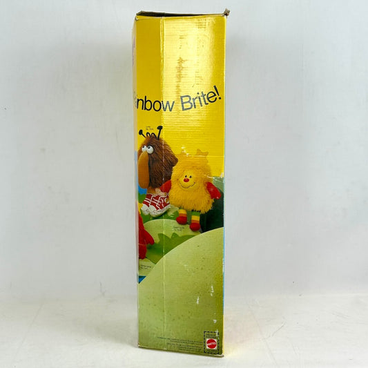Vintage 'Rainbow Brite' toy box with cartoon characters on a white background