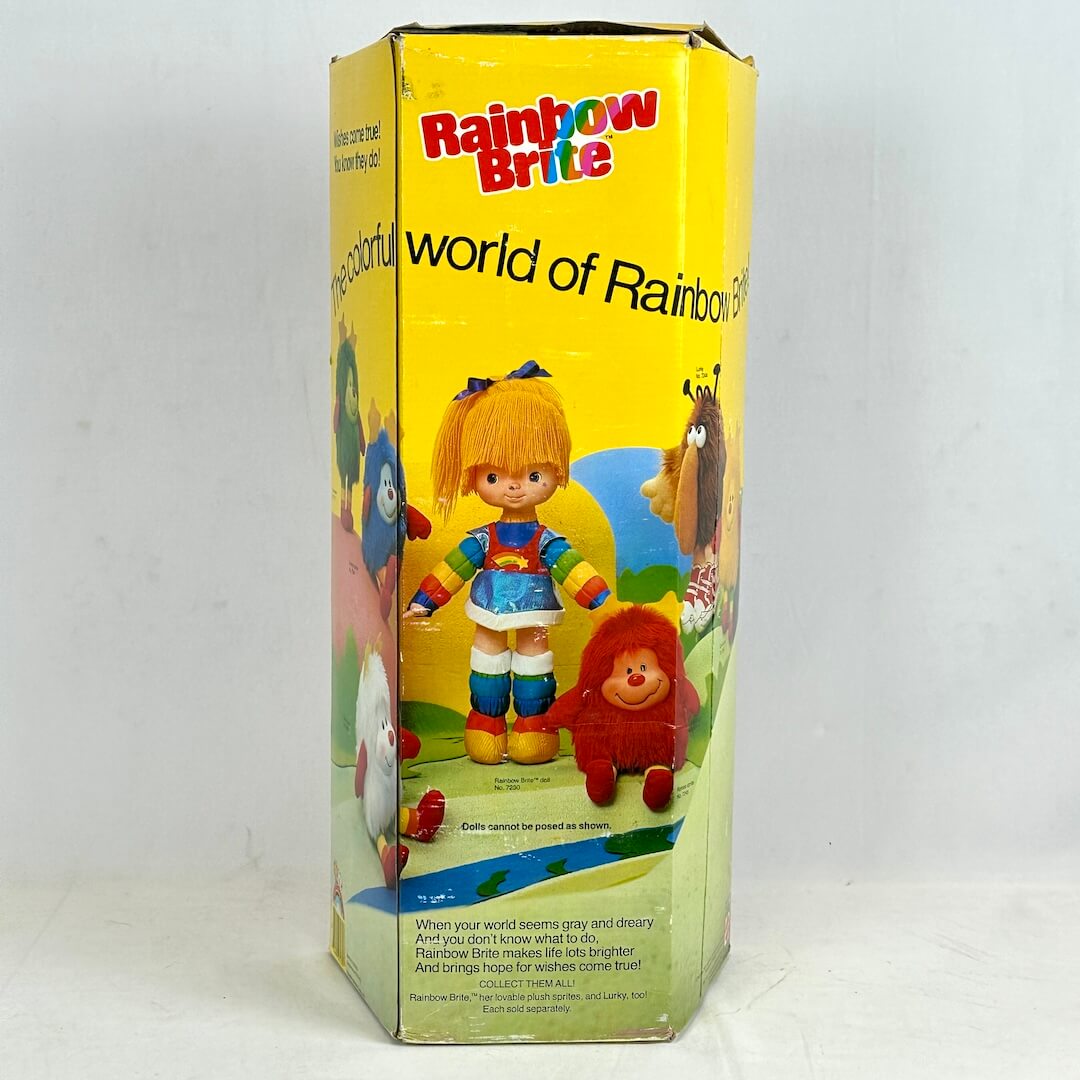Vintage Rainbow Brite toy box with colorful illustration on a white background