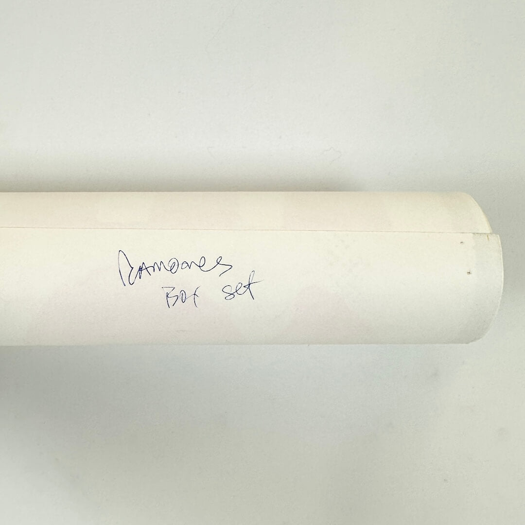 Rolled poster to show artist name in pen on back. 