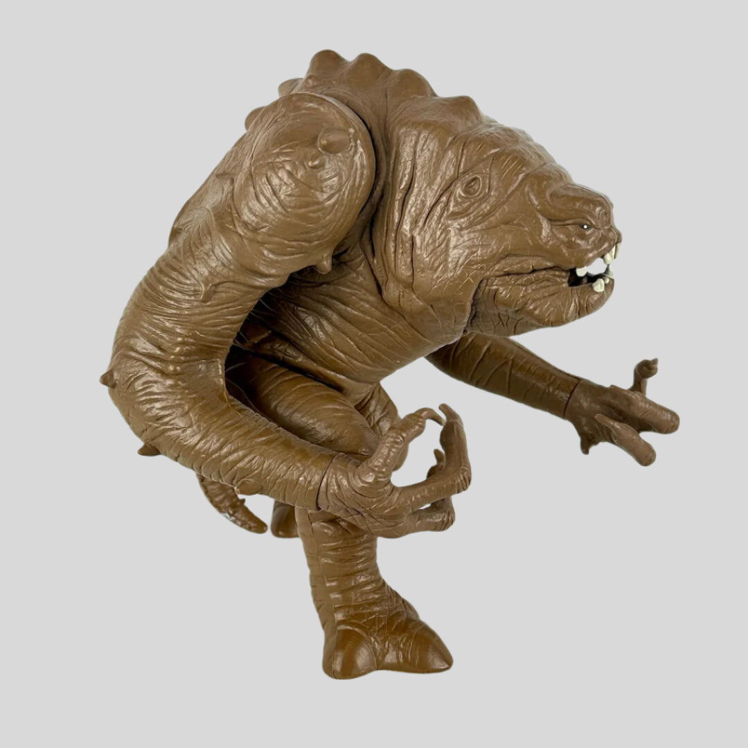 Brown creature-like figure on a white background