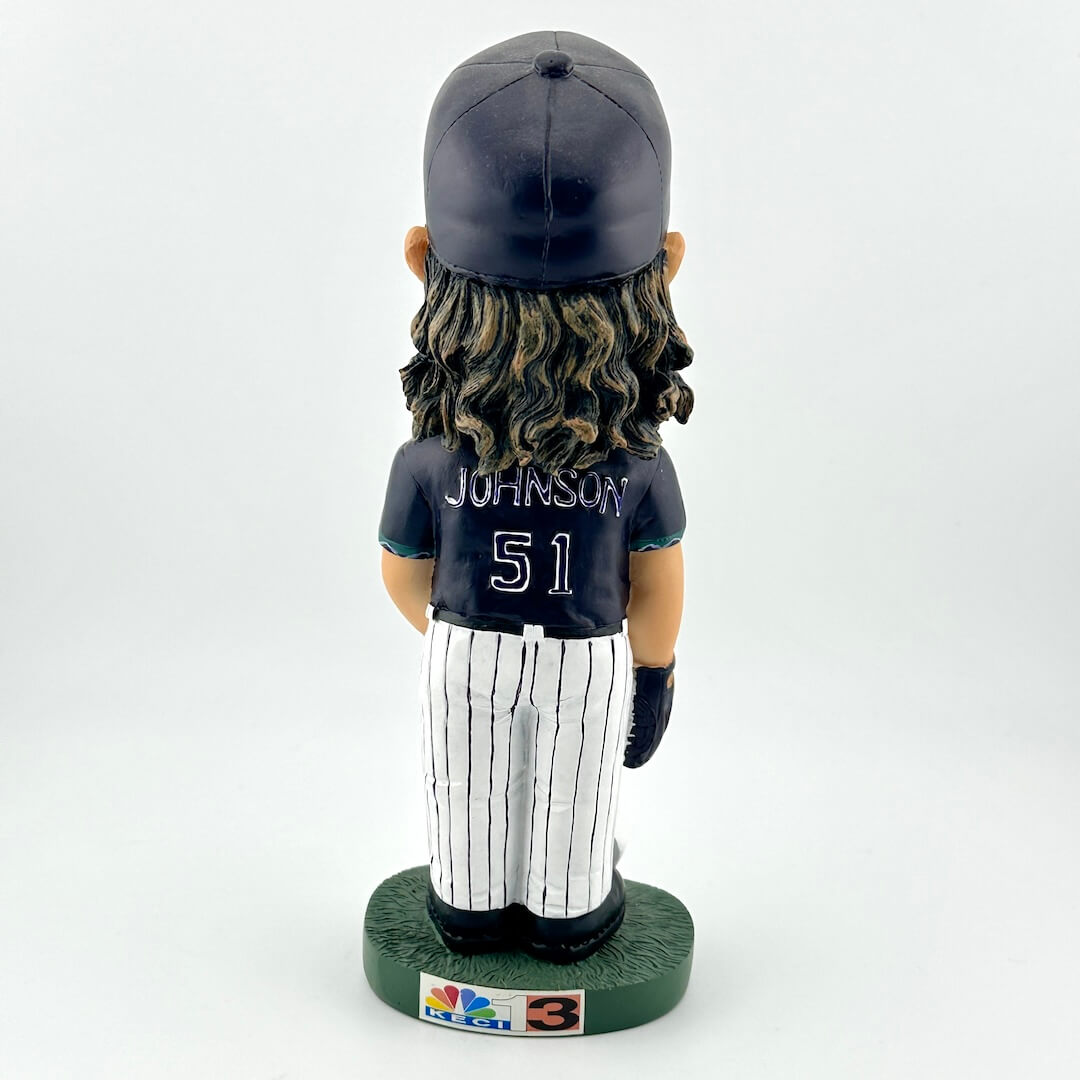 Bobblehead figure of a baseball player wearing a navy uniform with 'Johnson' and number '51'.