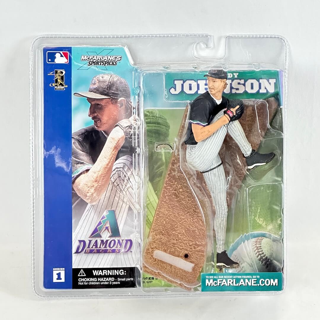 Baseball player action figure in packaging with Diamondbacks branding