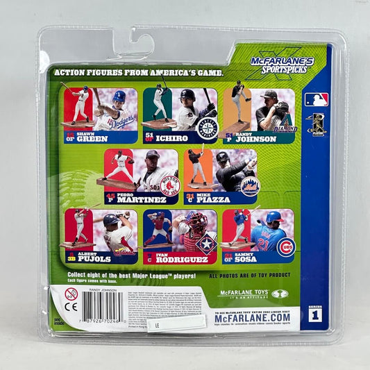 Packaged action figure set with baseball players on a gray background