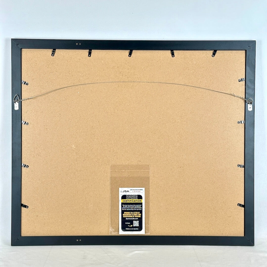 Back view of frame with authentication certificate attached. 