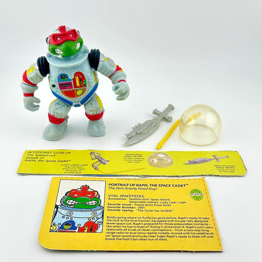TMNT action figure with accessories and character card back against white background. 