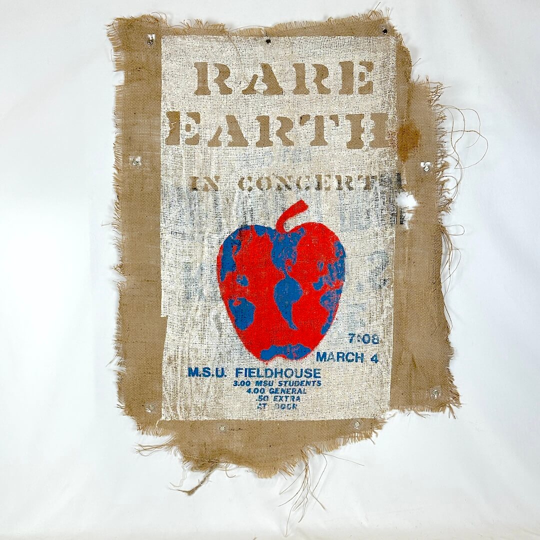 Vintage concert poster for Rare Earth with a red and blue apple graphic on a white background.