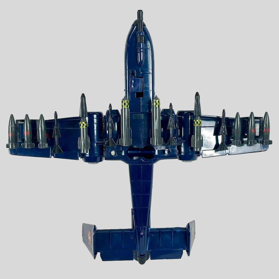 Model of a bomber aircraft with multiple engines on a white background