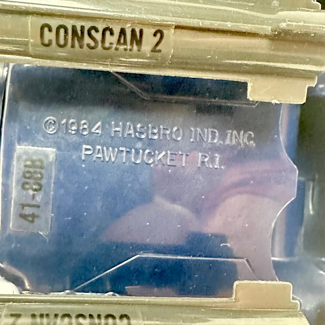 Vintage toy box with 'Conscan 2' sticker  and Hasbro Inc. copyright information.