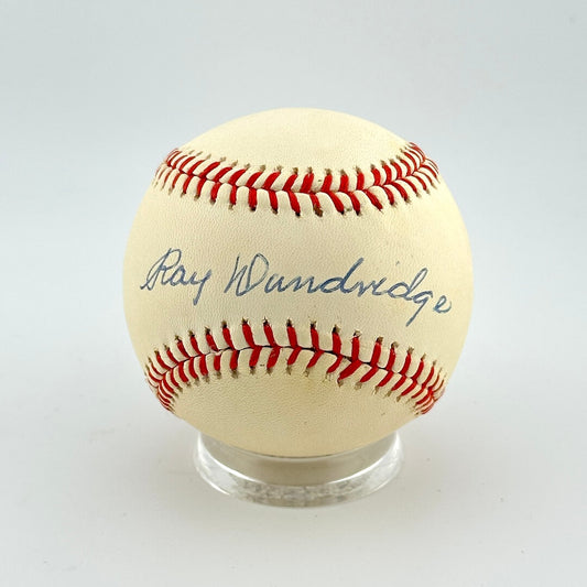 Baseball with 'Ray Dandridge' signature on a white background