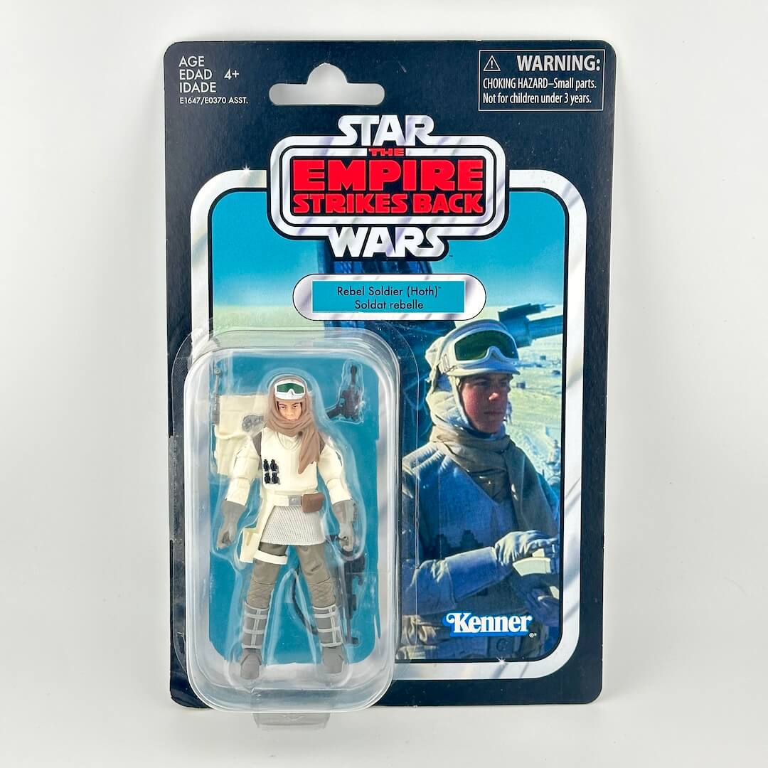 Star Wars action figure in original blister packaging showing figure in all white military uniform with accessories. 
