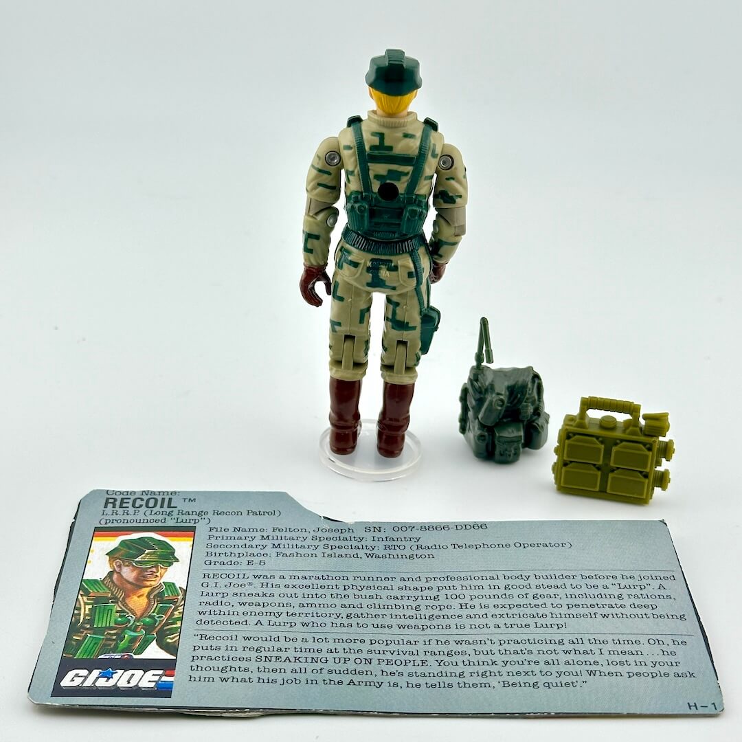 GI Joe action figure with accessories and character card on a white background