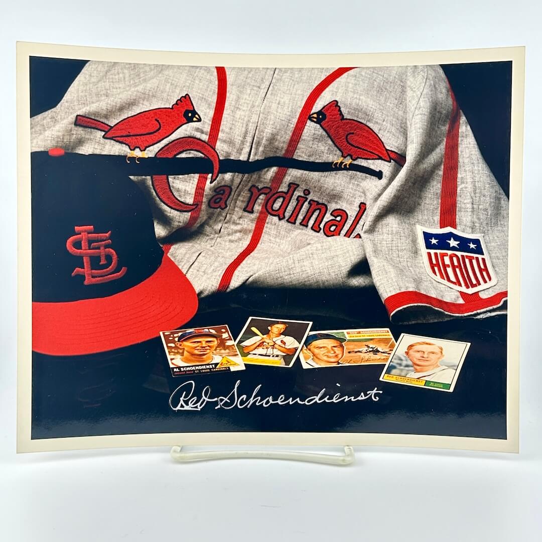 Photo of arranged baseball memorabilia featuring Red Schoendienst and his signature. 