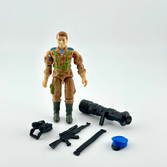 Toy figure with accessories on a white background