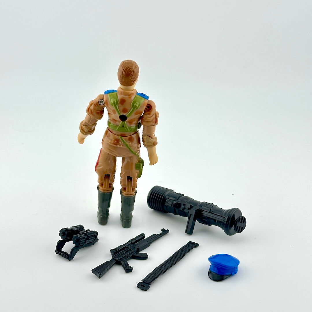 Toy figure with accessories on a white background