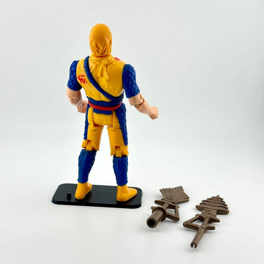 Action figure in blue and yellow outfit with two accessories against white background. 