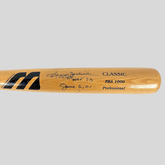 Wooden baseball bat with branding and text on a white background