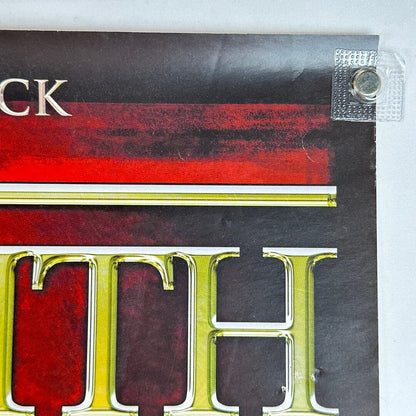 Top right corner of poster with some creases and holes. 