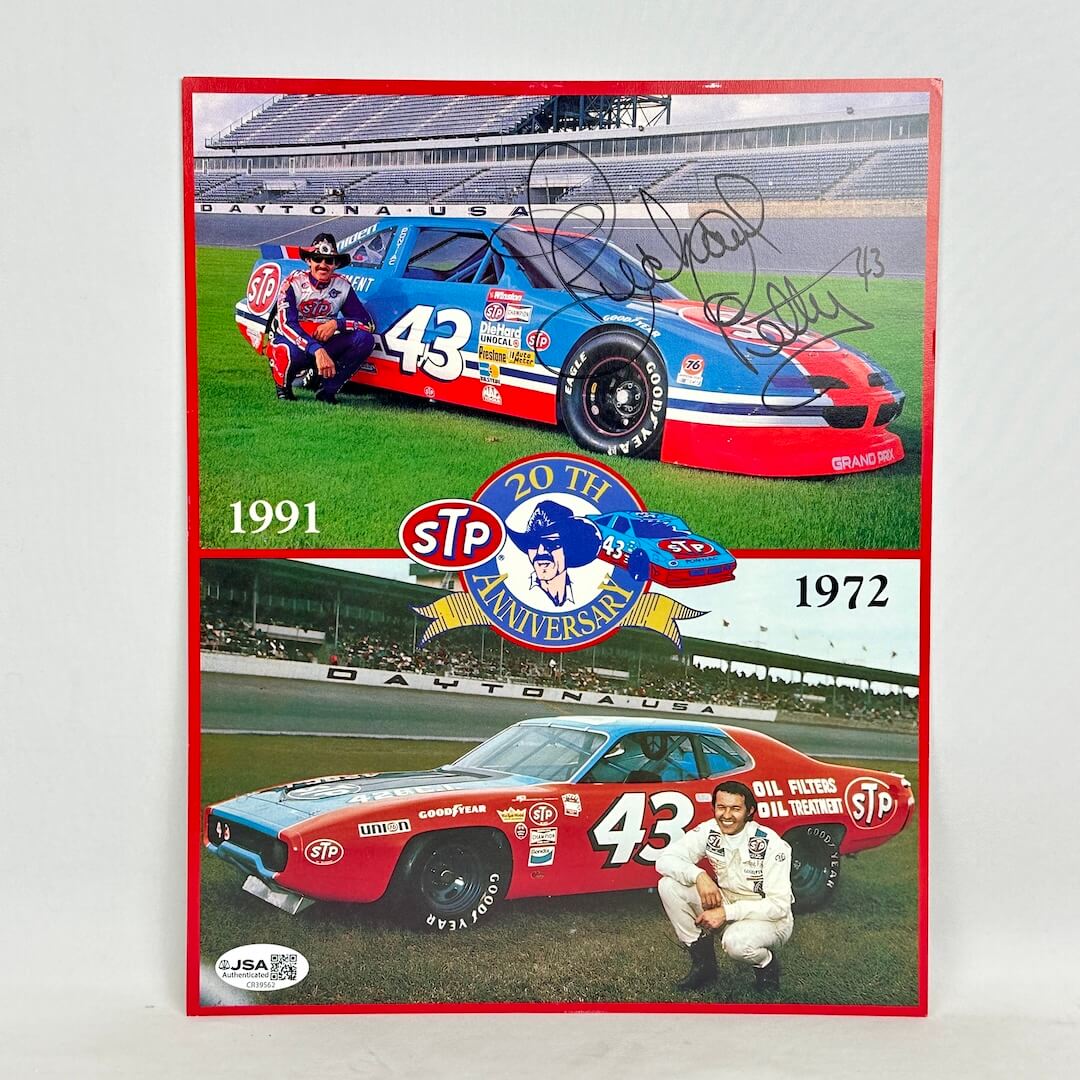 Card with two images, top image of Petty with 1991 car and bottom image is of him with his 1972 car, signed in top corner. 