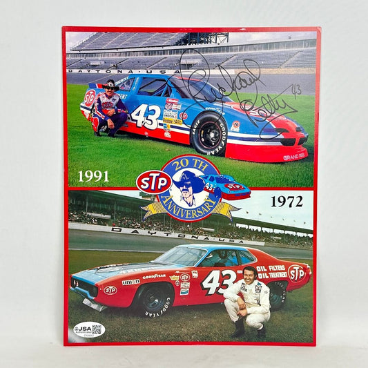 Card with two images, top image of Petty with 1991 car and bottom image is of him with his 1972 car, signed in top corner. 