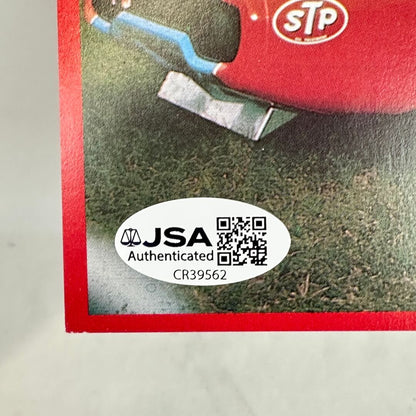 Close-up of a white oval JSA Authenticated sticker in bottom left corner of card. 