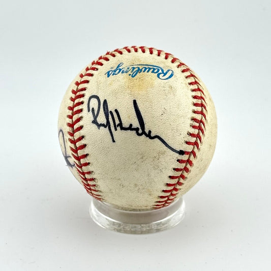 Baseball with autograph on a white background
