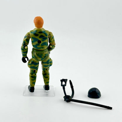 GI Joe action figure in camouflage outfit with accessories against white background. 