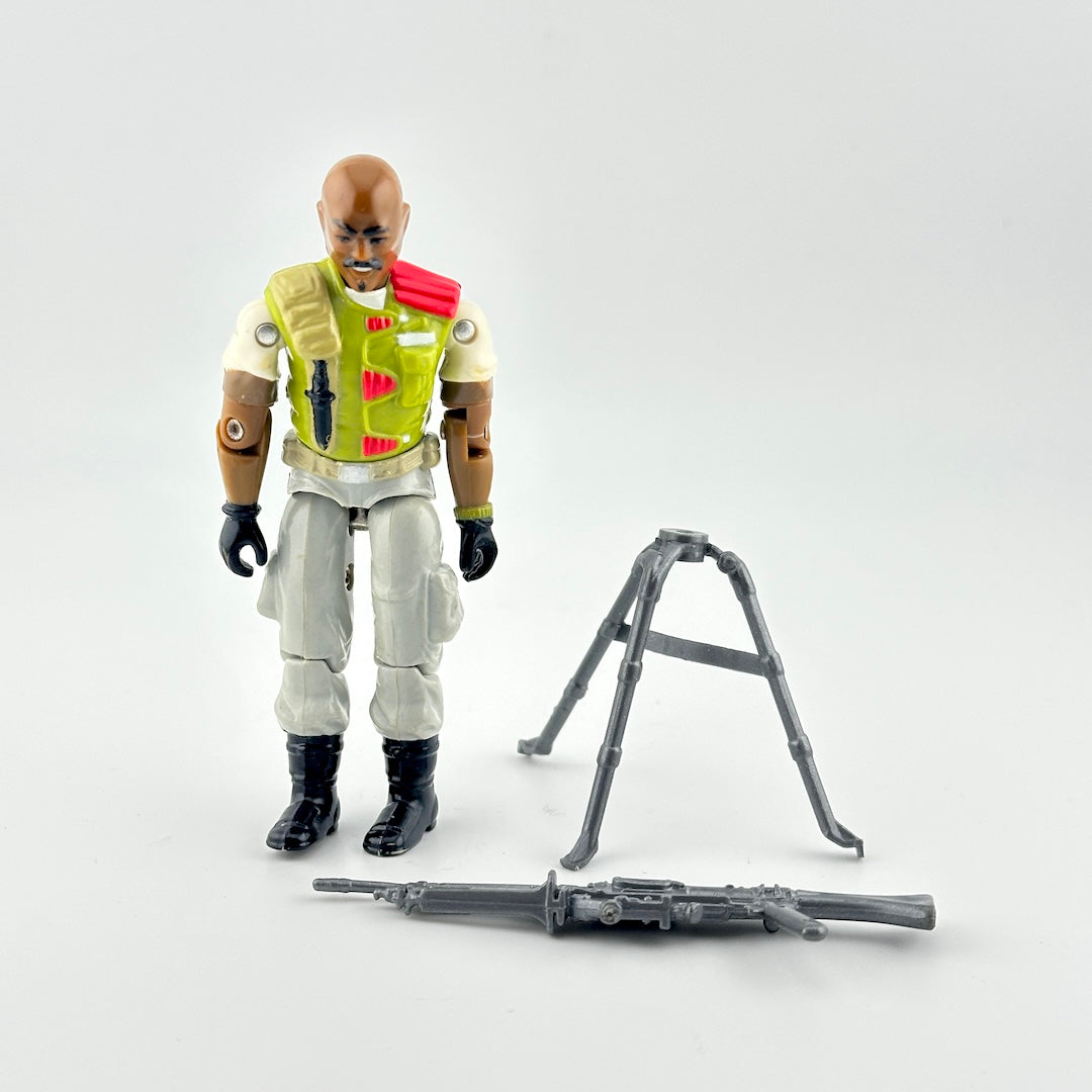 Action figure with a stand and weapon on a white background