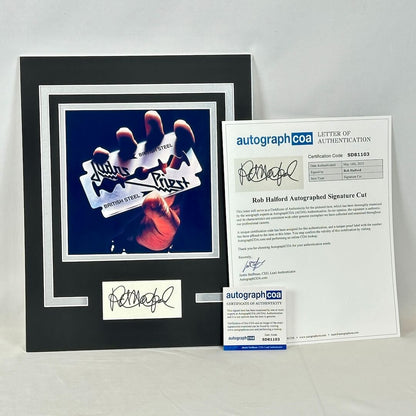 Framed autographed cutout with 'British Steel' logo and certificate of authenticity on a white background