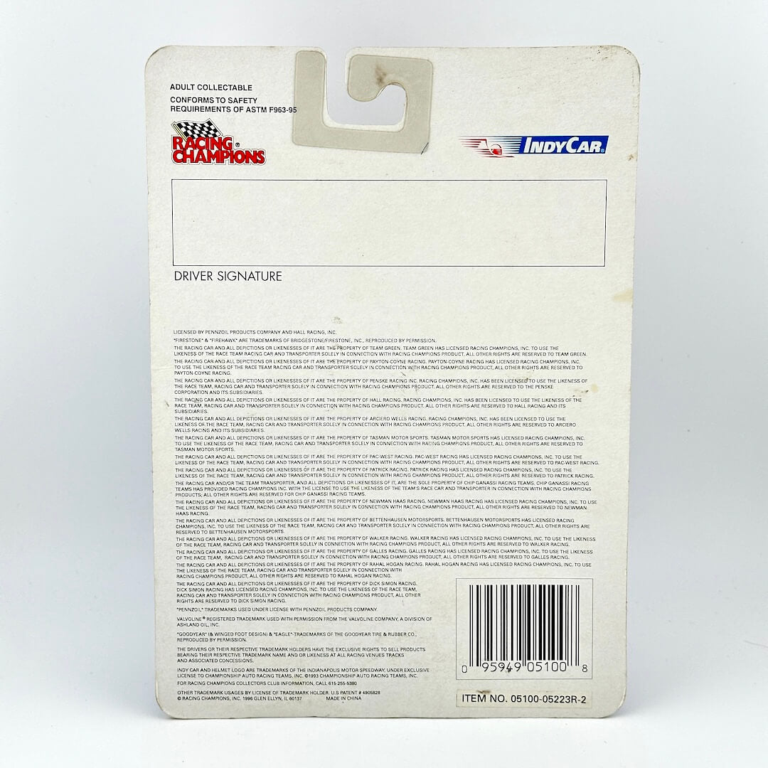 Back of a Racing Champions toy car packaging with text and branding.