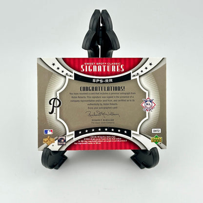 Card holder with a sports trading card featuring branding and text on a white background