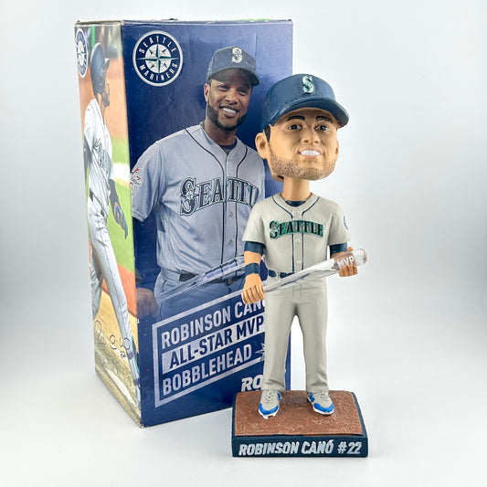 Baseball bobblehead figure with packaging featuring a player in a Seattle Mariners uniform.