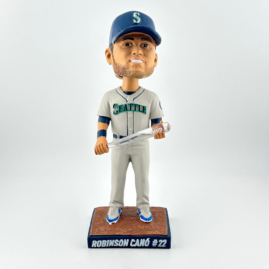 Bobblehead figure of a baseball player in a Seattle uniform with a bat on a white background