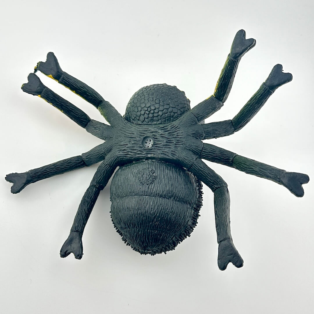 Underside of spider toy to show condition and country of origin. 