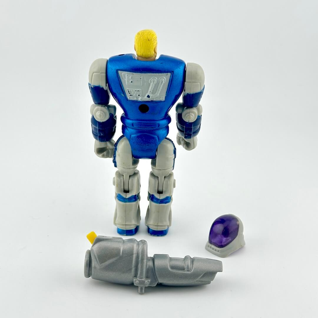 GI Joe action figure in blue and silver armor, pictured with helmet and gun accessory on white background. 