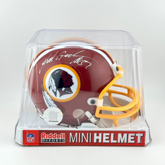 Maroon and yellow mini helmet with Riddell and NFL branding with native imagery for logo. 