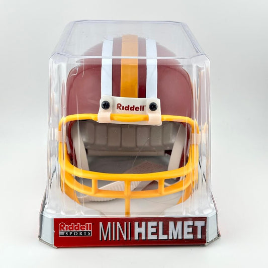 Riddell mini football helmet in clear packaging on a white background