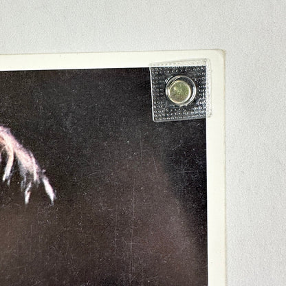 Top right corner of photo in good condition. 