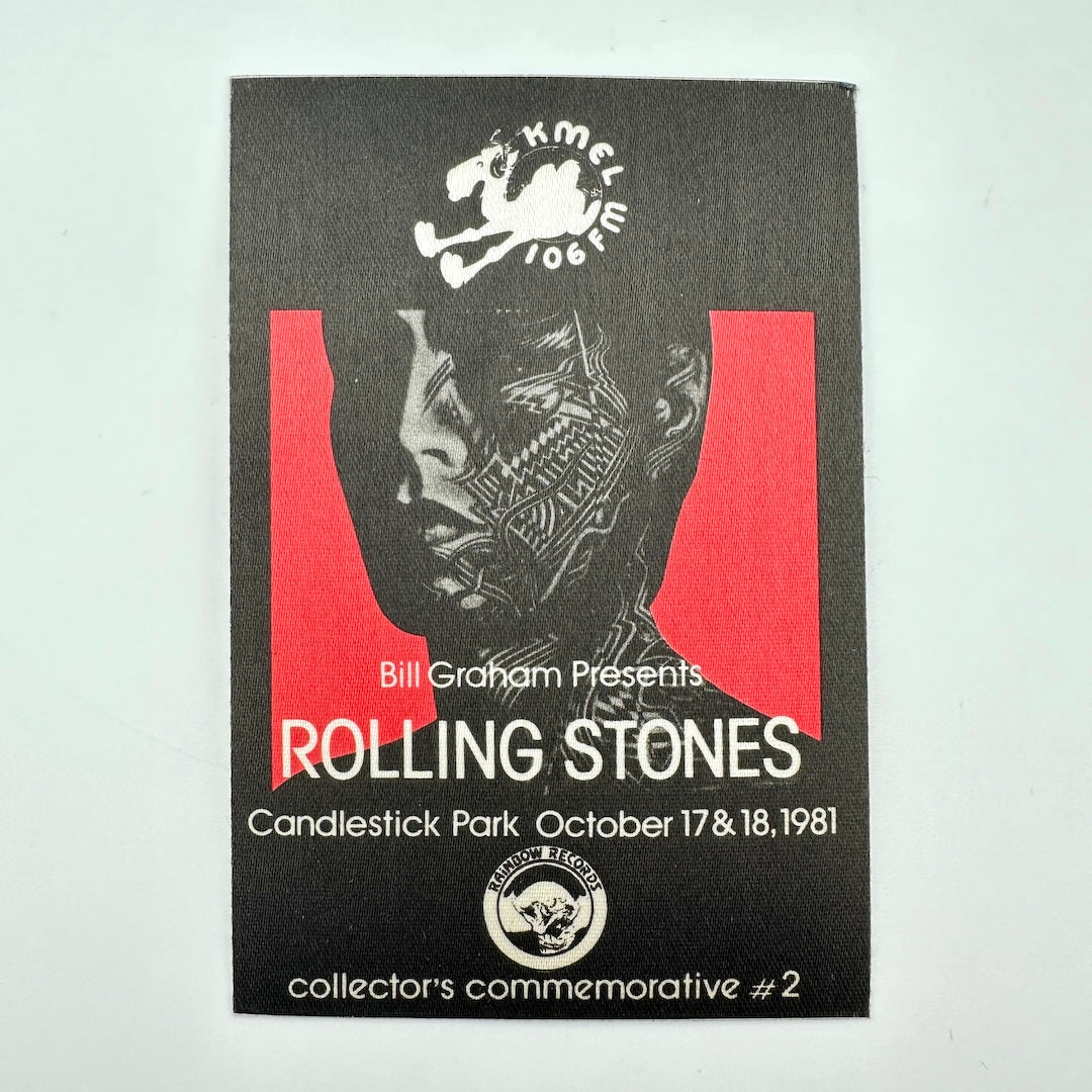 Backstage pass for Rolling Stones with tattooed person as central image and event details in white text. 