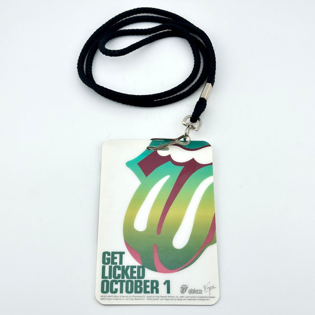 Lanyard with a Rolling Stones-themed badge on a white background