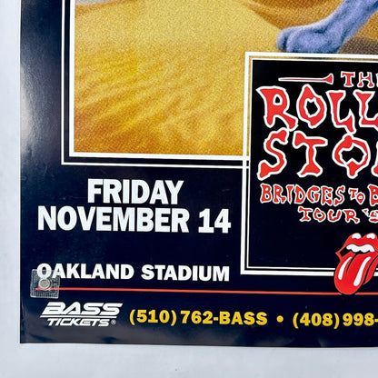 Bottom left corner of poster with crease and event details. 