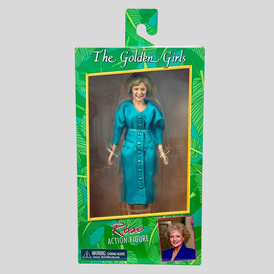 Rose action figure from Golden Girls in green box on gray background. 