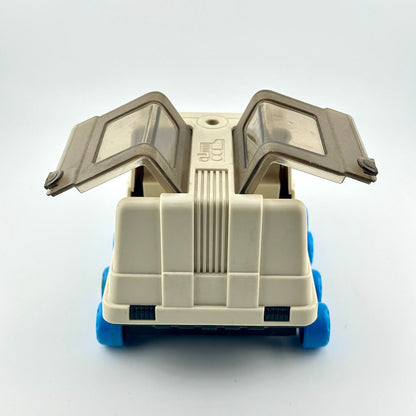 Toy moon rover with blue wheels against white background. 