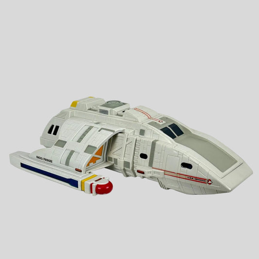 Toy spaceship model on a white background