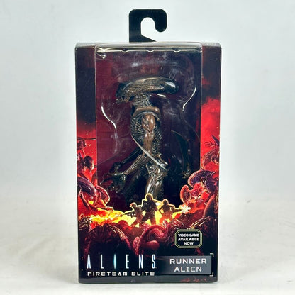 Aliens figurine in packaging with 'Fireteam Elite' branding on a white background